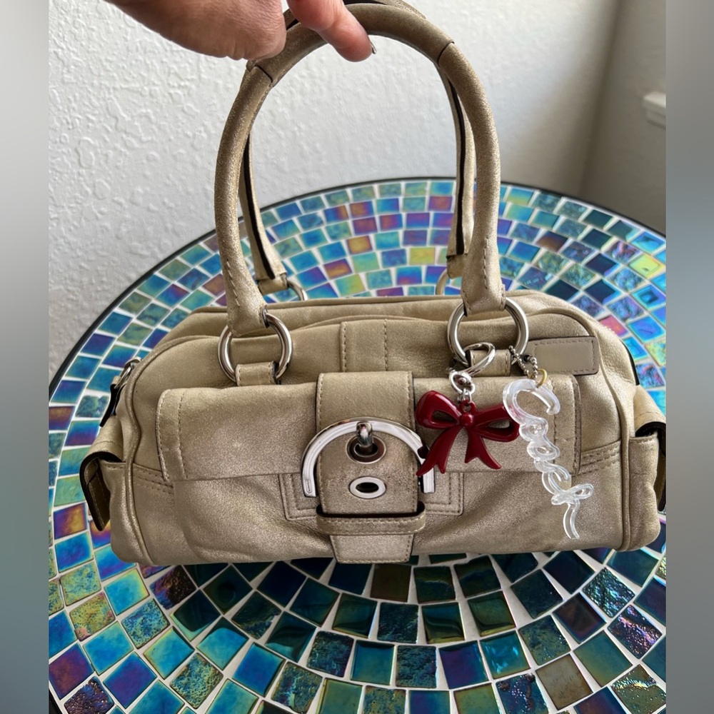 Vintage Coach SoHo Legacy bag in metallic gold leather.